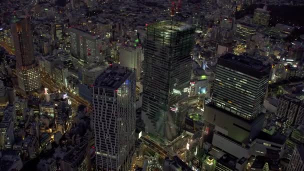 日本約2018年 夜の東京 渋谷の空中風景 レッドカメラでヘリコプターから撃たれた — ストック動画