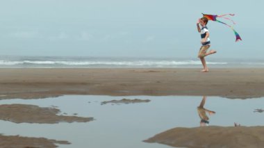 Uçurtma beach, yavaş çalışan çocuk