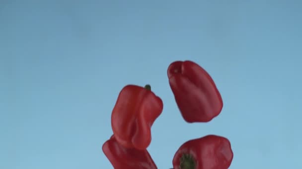 Red Peppers Flying Slow Motion Shot Phantom Flex 1000 Frames — Stock Video