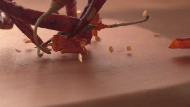 Chili Peppers Falling Wooden Surface Super Slow Motion Shot Phantom — Stock Video