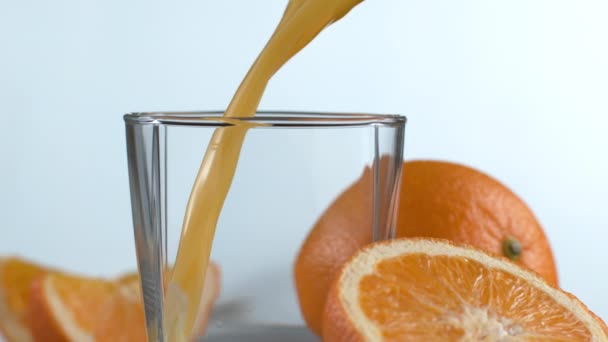 Orangensaft Superzeitlupe Einschenken Aufnahme Mit Phantom Flex Hochgeschwindigkeitskamera — Stockvideo