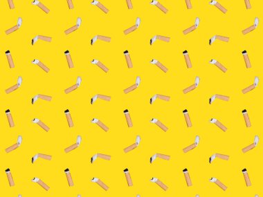 Sigara ve sarı arka planlı desen