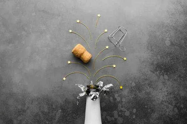 Champagne Bottle Confetti Stars Form Fireworks Dark Grey Background New — Stock Photo, Image