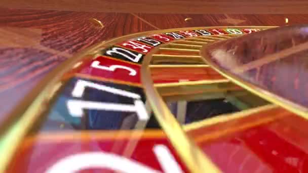 Closeup view at casino roulette table with rotating wooden roulette wheel — Stock Video