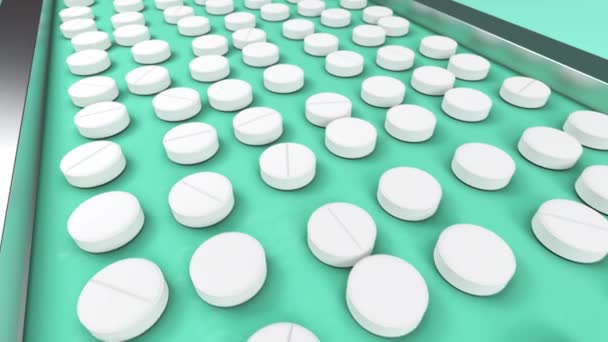 White pills on the conveyor line of pharmaceutical factory moving for packaging — Stock Video