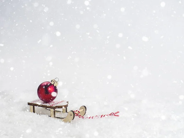 Red Glass Ball Sled Concept Winter Holidays New Year — Stock Photo, Image