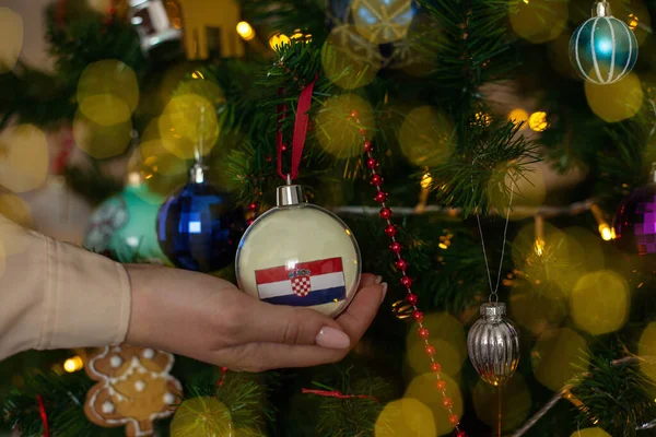 Close Girls Hand Holding Christmas Ball Fir Tree Flag Croatia — Stockfoto