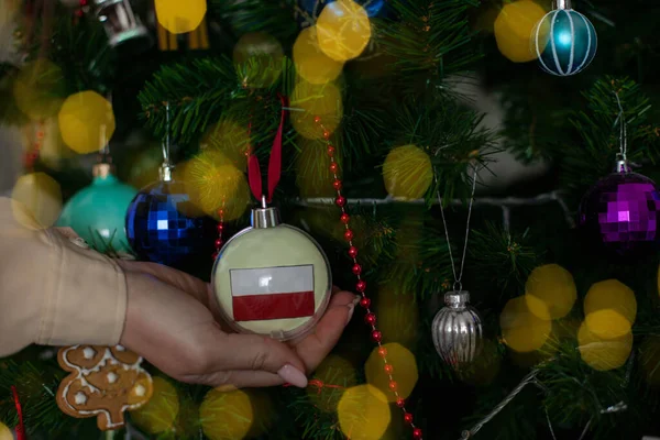 Close Girls Hand Holding Christmas Ball Fir Tree Flag Poland — Photo