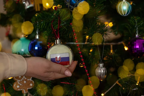 Close Girls Hand Holding Christmas Ball Fir Tree Flag Slovakia — 스톡 사진