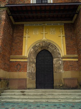 The door in The Roman Catholic church of St. Bartholomew, Drohobych, Ukraine. Medieval iron door of Church 15-16th Century, gothic, baroque architecture.