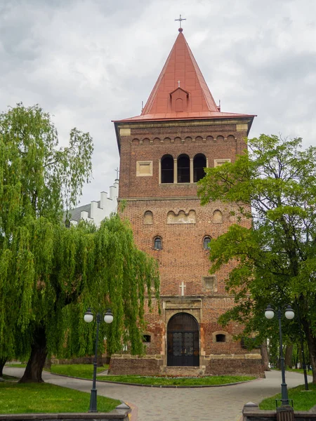 Defense tower of the Roman-Catholic Church of St. Bartholomew, founded in 1392, consecrated in 1511, in Drohobych, Ukraine. Gothic and baroque architecture. Former castle tower in Drogobych