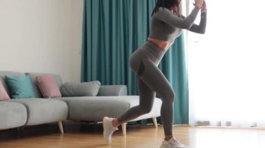 female butt workout squats at home. Fitness at home concept