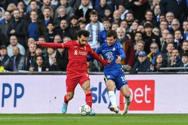 Liverpool 'dan Mohamed Salah # 11 Chelsea' den Mason Tepesi 19 'u tutuyor.
