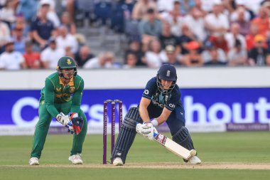Joe Root of England with a reverse sweep for a boundary