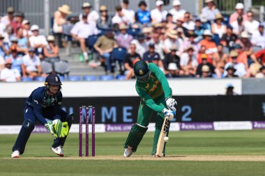 Rassie Van Der Dussen of South Africa hits a four (4)