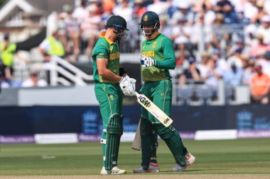 Rassie Van Der Dussen of South Africa congratulates Aiden Markram of South Africa after he hits a boundary