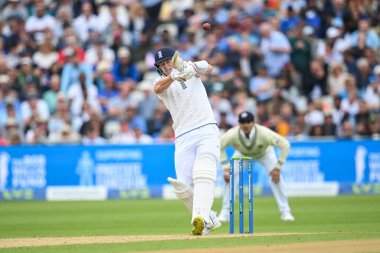 Matthew Potts of England hits a four (4)