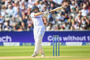 Joe Root of England hooks the ball for a single