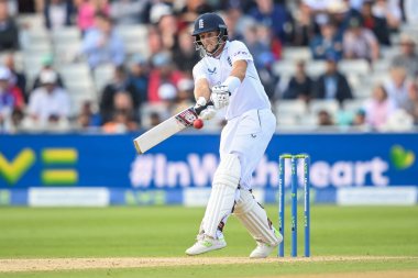 Joe Root of England clips the ball for a single