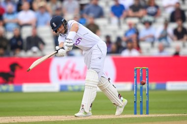 Joe Root of England hits a single