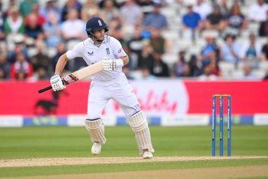Joe Root of England in action during the game