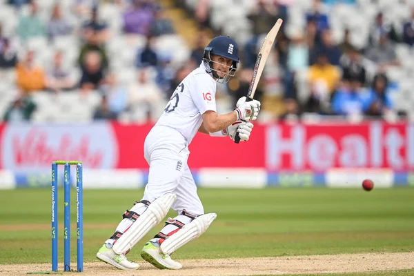 Joe Root of England cuts the ball away fine to the boundary