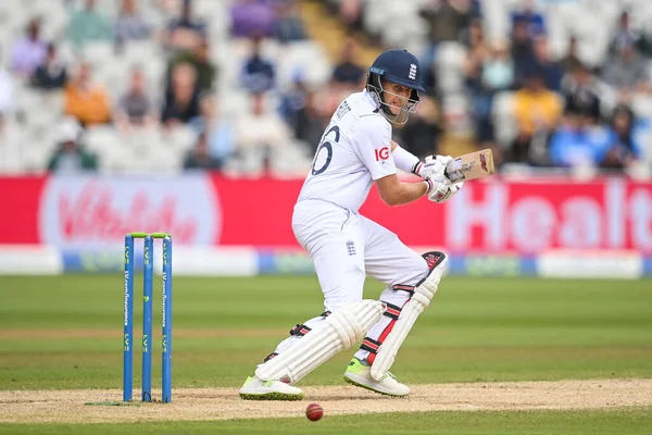 Joe Root of England cuts the ball away fine to the boundary