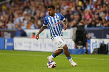 Josh Koroma #10 of Huddersfield Town on the ball