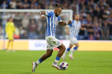 Sorba Thomas #7 of Huddersfield Town on the ball 