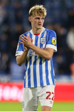 Jack Rudoni #22 of Huddersfield Town applauds the fans at the final whistle 