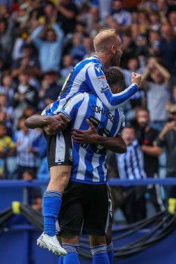 Marvin Johnson #18 of Sheffield Wednesday celebrates his goal to make it 1-0 with his teammates