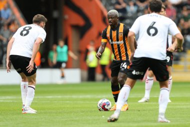 Jean Michael Seri #24 of Hull City surrounded by defenders