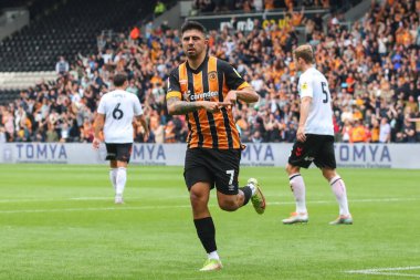 Ozan Tufan #7 of Hull City celebrates his goal to make it 1-1
