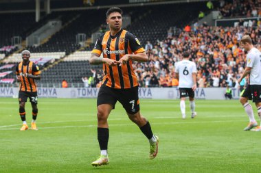 Ozan Tufan #7 of Hull City celebrates his goal to make it 1-1