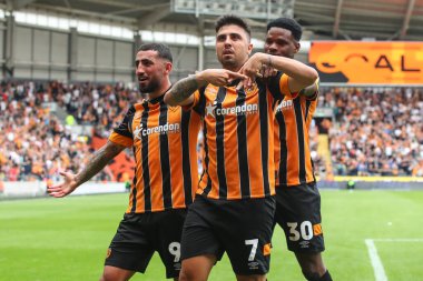 Ozan Tufan #7 of Hull City celebrates his goal to make it 1-1