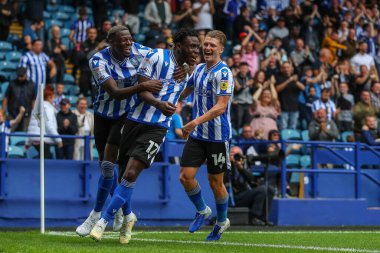 Fisayo Dele-Bashiru #17 of Sheffield Wednesday celebrates his goal to make it 2-1 with Dominic Iorfa #6 of Sheffield Wednesday and George Byers #14 of Sheffield Wednesday