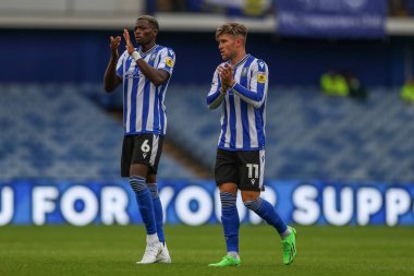 Josh Windass #11 of Sheffield Wednesday and Dominic Iorfa #6 of Sheffield Wednesday applaud the fans after the game