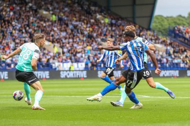 Fisayo Dele-Bashiru #17 of Sheffield Wednesday has a shot at goal