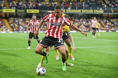 Iliman Ndiaye #29 of Sheffield United controls the ball under pressure 