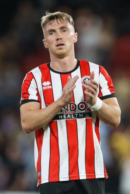 Ben Osborn #23 of Sheffield United claps the travelling fans at the final whistle