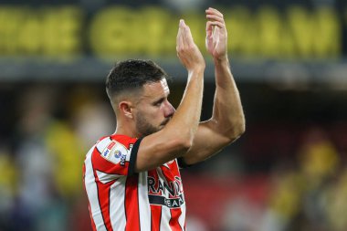 George Baldock #2 of Sheffield United applauds the travelling fans 