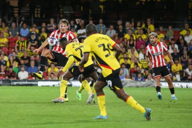 Sander Berge #8 of Sheffield United attempts to control the ball in a crowded penalty area 
