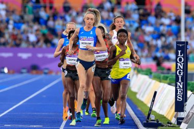 Eilish McColgan of Scotland leads the field in the 10,000 metres