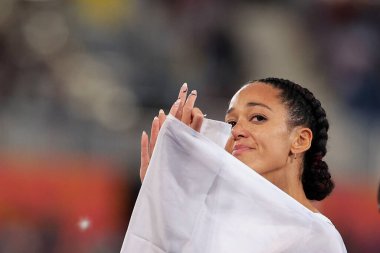 Katerina Johnson-Thompson celebrates her gold medal in the Heptathlon