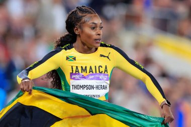 Elaine Thompson-Herah of Jamaica after winning  the womens 100m final  