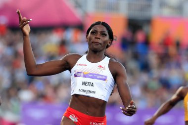 Daryll Neita of England wins her 100m semi final