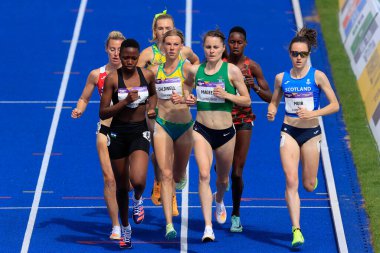 Laura Muir of Scotland leads on the first lap of the heat of the Womens 1500m  