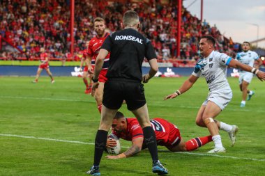 Elliot Minchella #17 of Hull KR goes over for a try in the first which is disallowed for a forward pass
