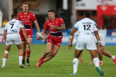 Shaun Kenny-Dowall #4 of Hull KR runs at the Toulouse defence