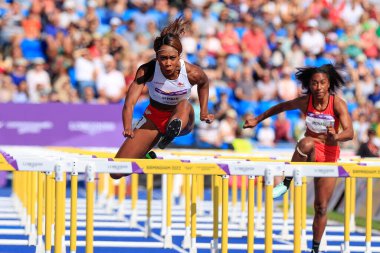 Cindy Sember of England on her way to winning the heat of the womens 100m hurdles 